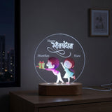 Shayona Gift Shop-Personalized Rakshabandhan Brother Sister Acrylic LED Night Light – Custom Engraved Name Lamp with Cute Brother Giving Gift Illustration & Wooden Base, Rakhi Gift for Sister & Brother
