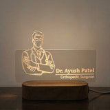 Shayona Gift Shop-Personalized Doctor Line Art Acrylic LED Name Plate Lamp | Custom Doctor Name & Specialization Engraved Desk Light with Wooden Base | Professional Gift for Doctors, Surgeons & Medical Graduates