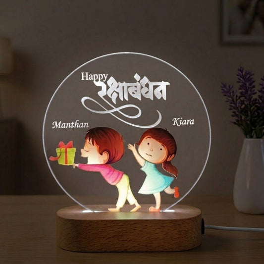 Shayona Gift Shop-Personalized Rakshabandhan Brother Sister Acrylic LED Night Light – Custom Engraved Name Lamp with Cute Brother Giving Gift Illustration & Wooden Base, Rakhi Gift for Sister & Brother